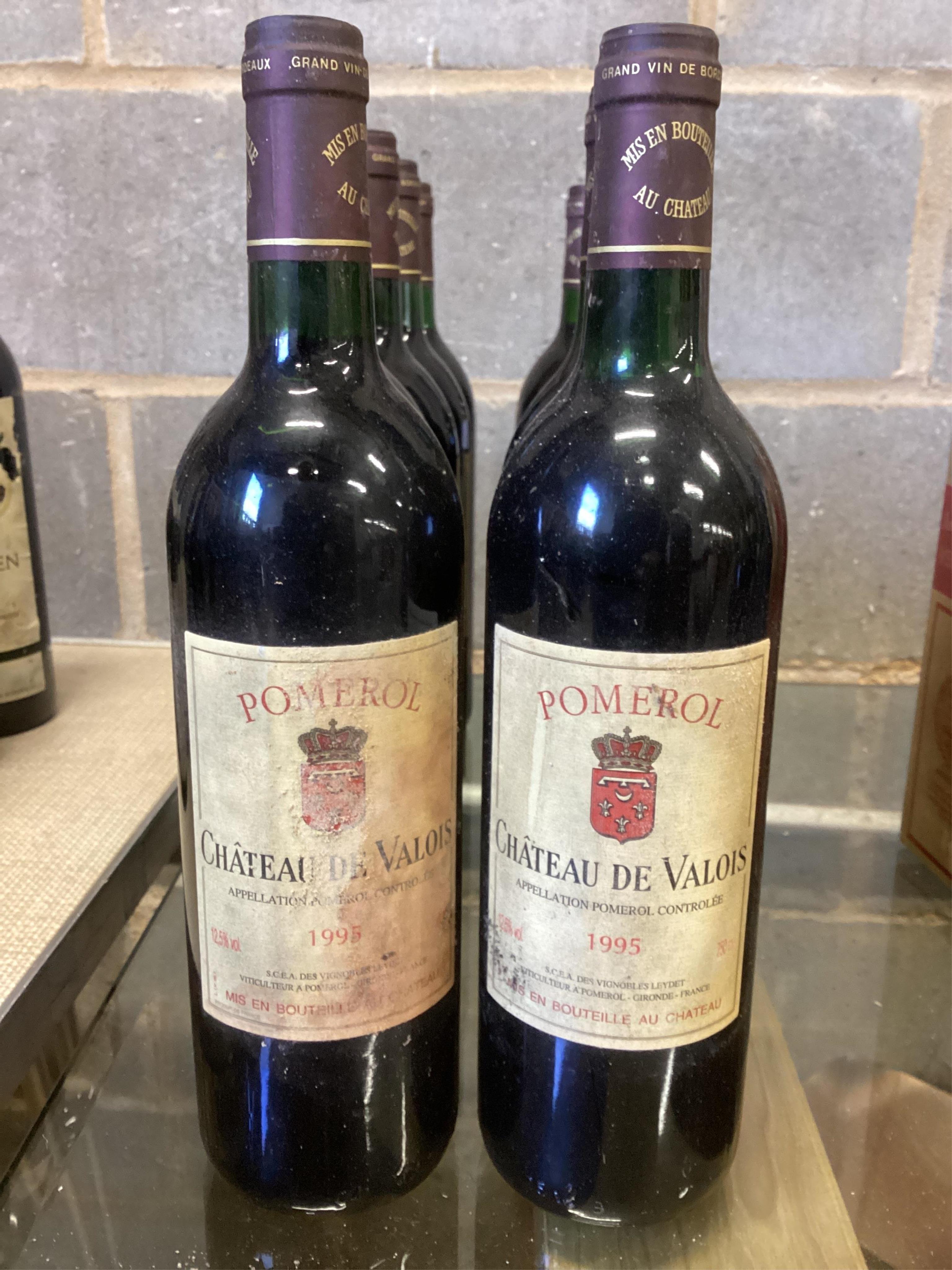 Ten bottles of Chateau De Valois Pomerol 1995. (From a local private cellar). Condition - fair, labels with some degradation